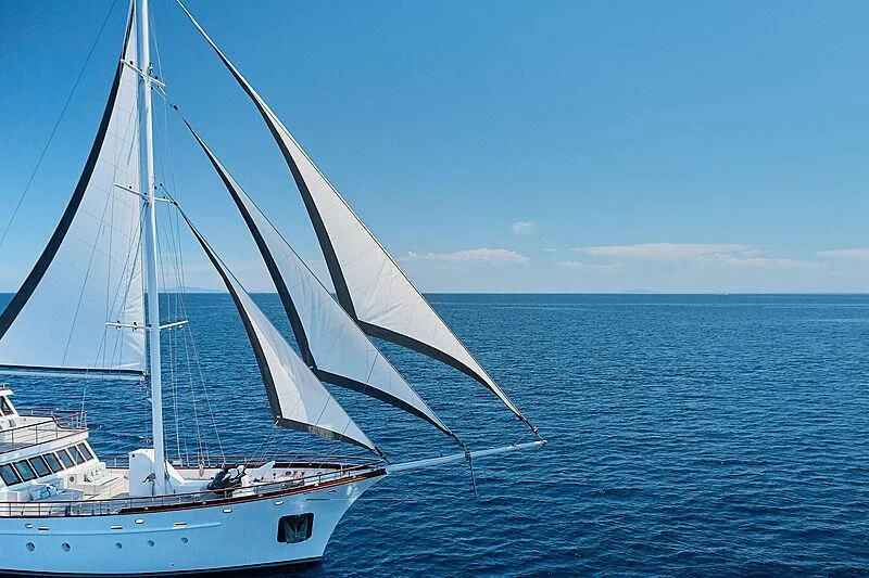 a boat sailing in the sea aboard CORSARIO Yacht for Charter