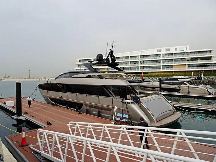 a boat docked at a pier aboard AL ANBAR Yacht for Sale