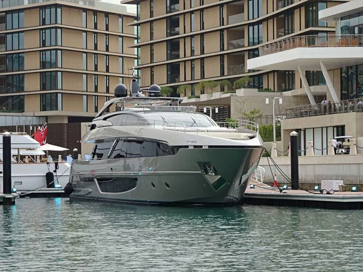 a boat docked in a harbor aboard AL ANBAR Yacht for Sale