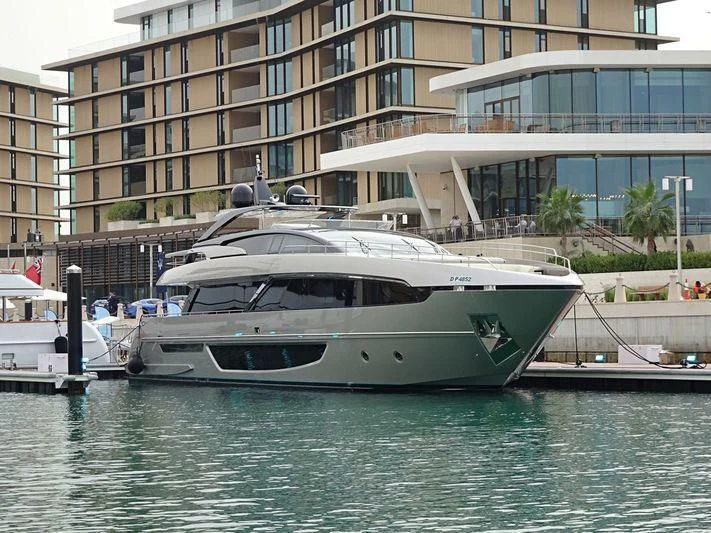 a boat docked in front of a building aboard AL ANBAR Yacht for Sale