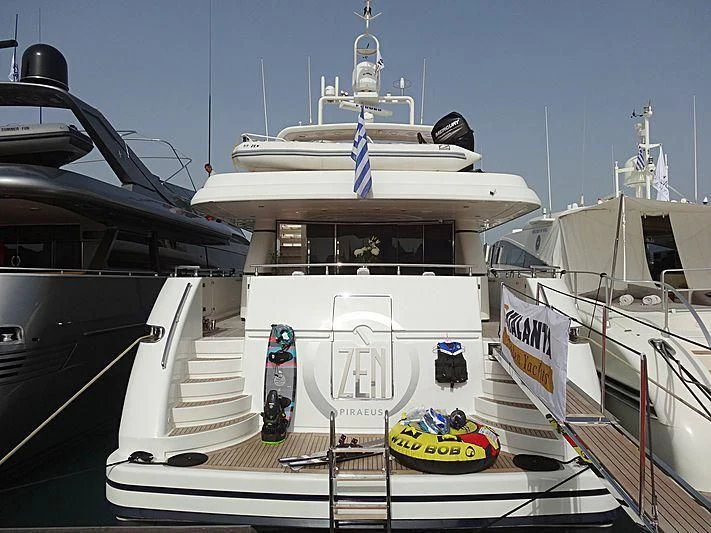 a boat docked at a pier aboard ZEN Yacht for Sale