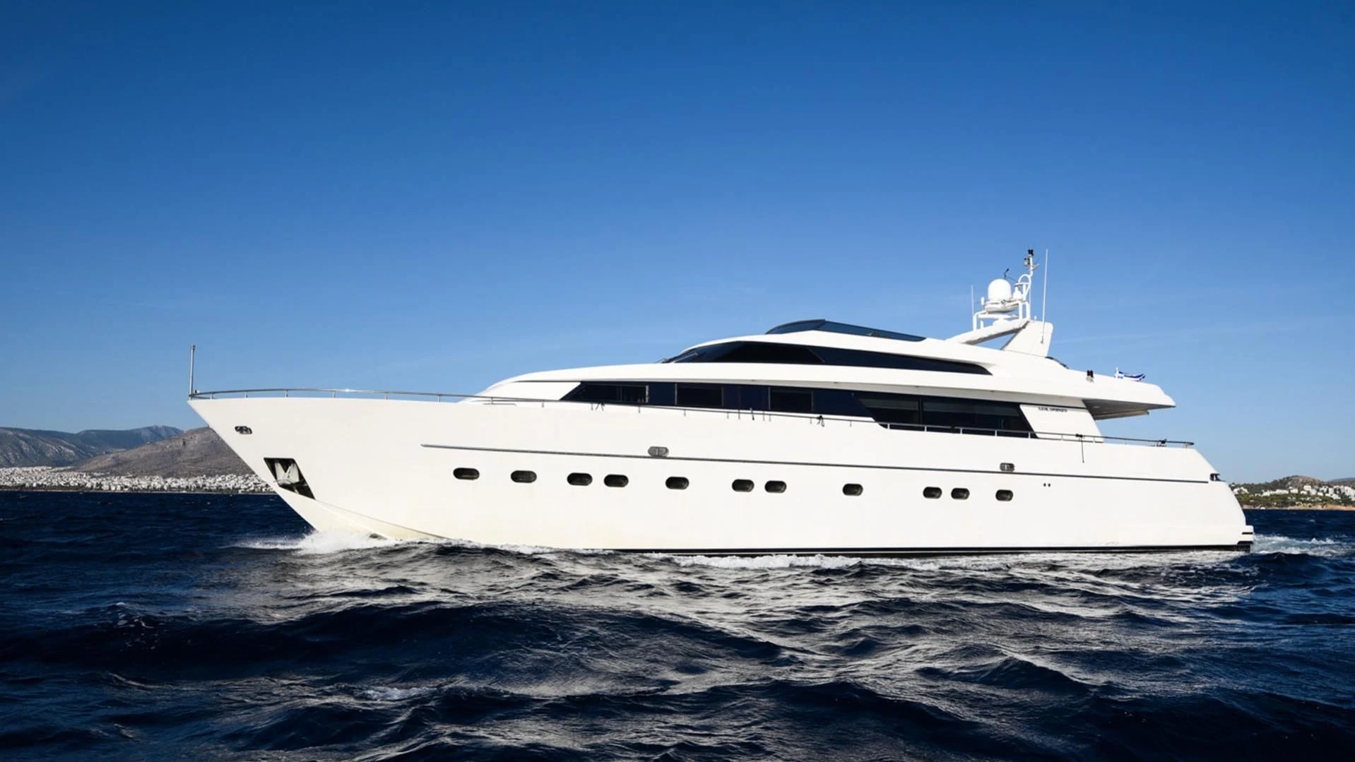 a white yacht in the water aboard ZEN Yacht for Sale