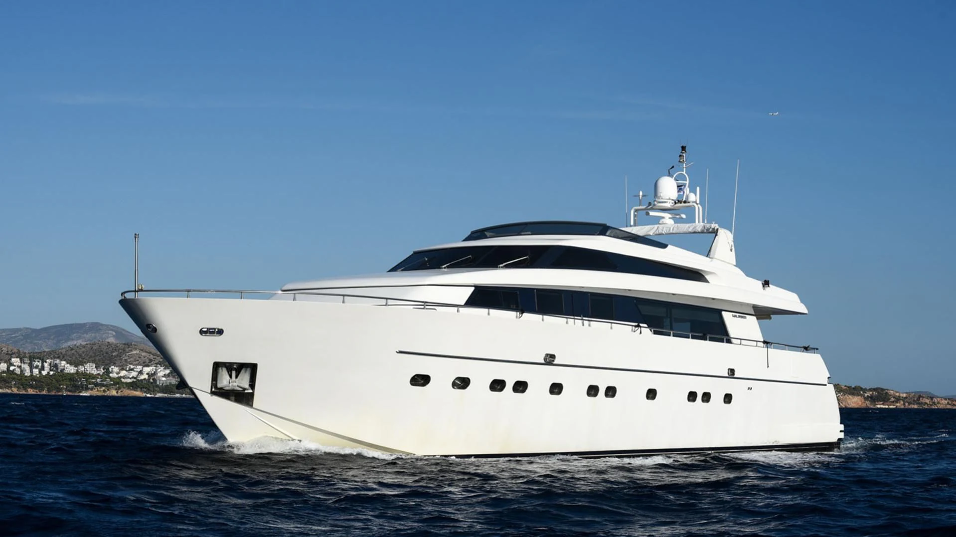 a white yacht in the water aboard ZEN Yacht for Sale
