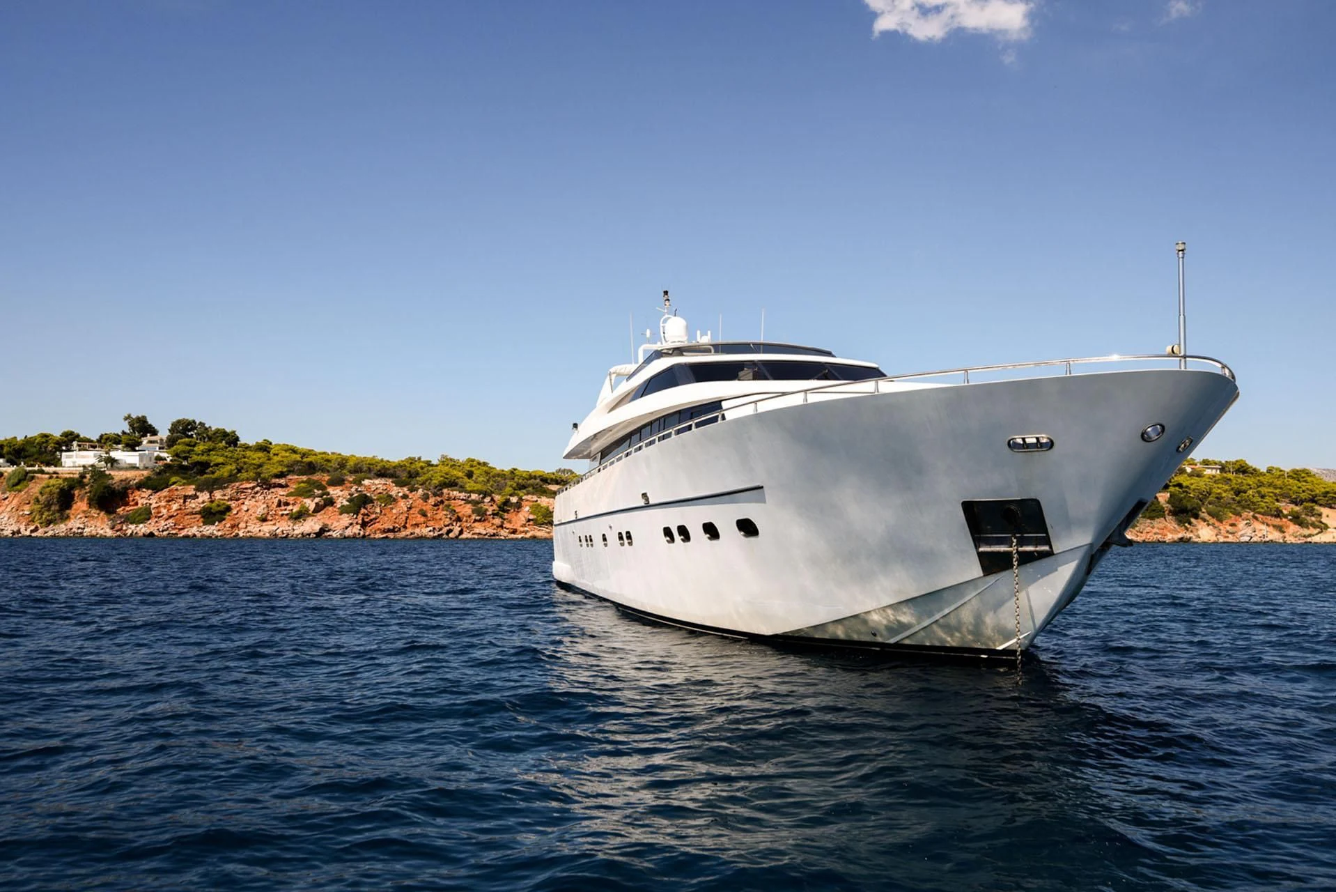 a white yacht on the water aboard ZEN Yacht for Sale
