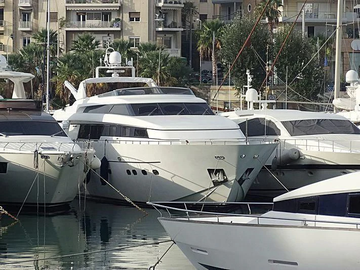several boats docked in a harbor aboard ZEN Yacht for Sale