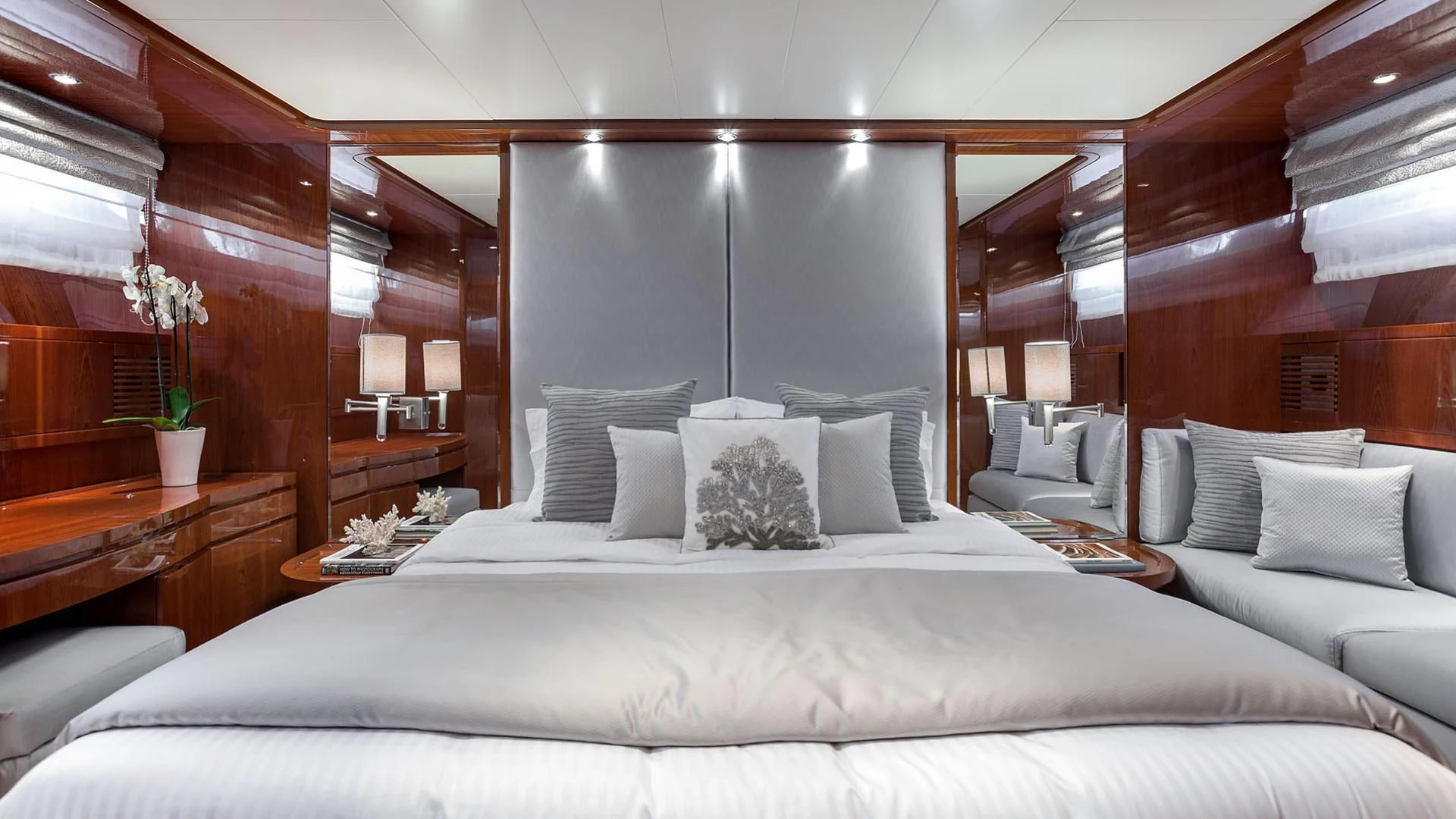 a large bed in a room aboard ZEN Yacht for Sale