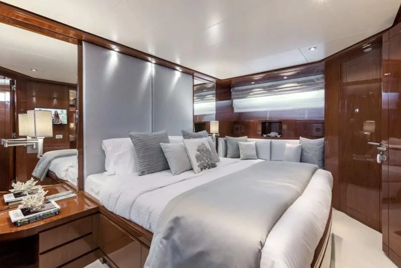 a bed in a room aboard ZEN Yacht for Sale