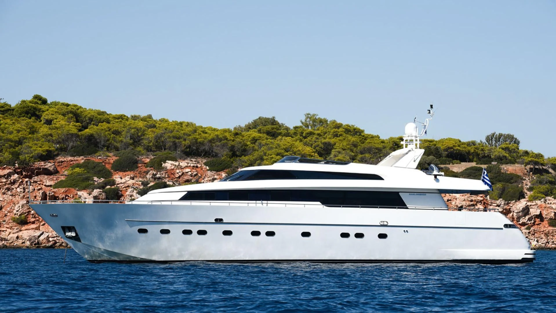 a white yacht on the water aboard ZEN Yacht for Sale