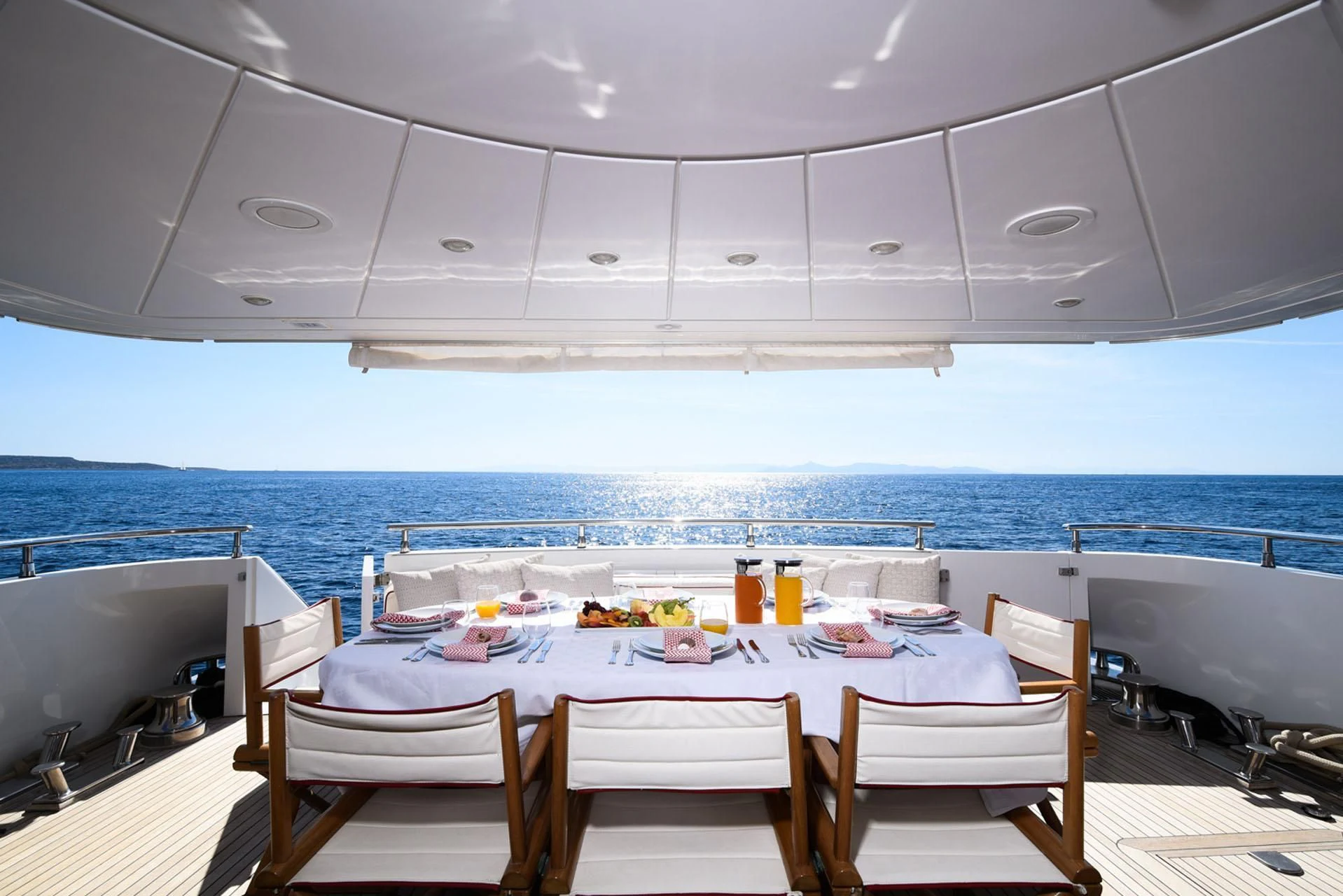 a table set for a meal aboard ZEN Yacht for Sale