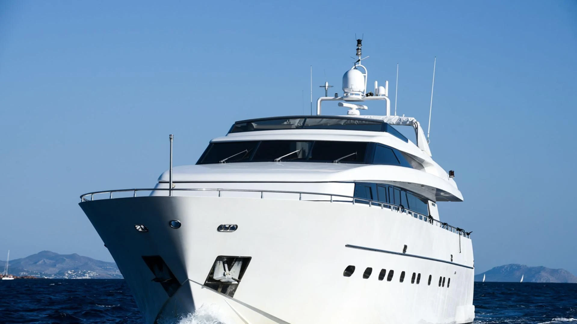 a white yacht in the water aboard ZEN Yacht for Sale