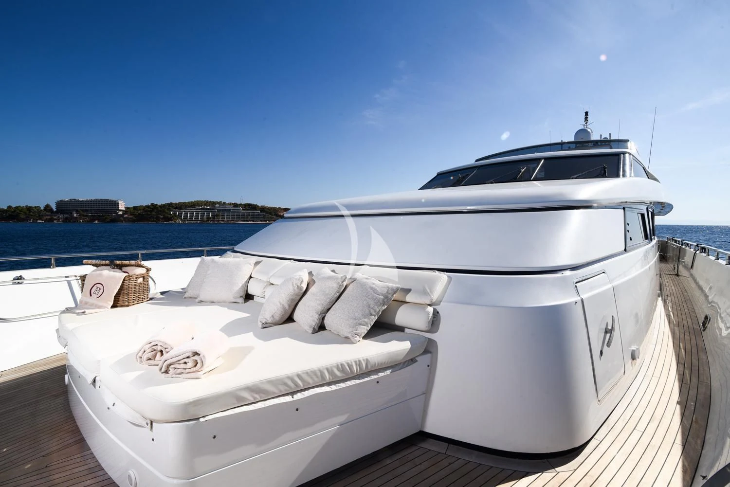 a white boat on a dock aboard ZEN Yacht for Sale