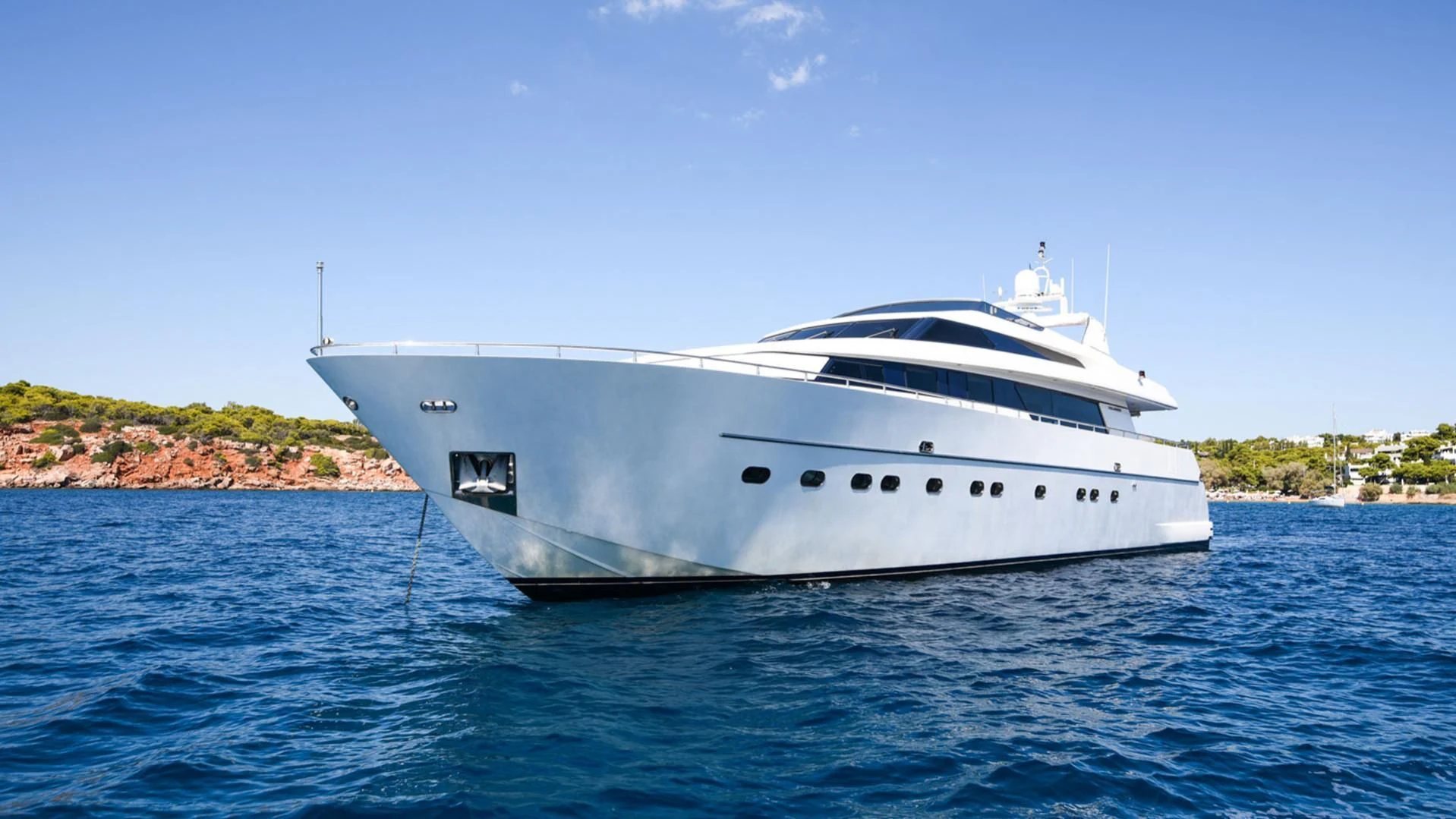 a white yacht in the water aboard ZEN Yacht for Sale