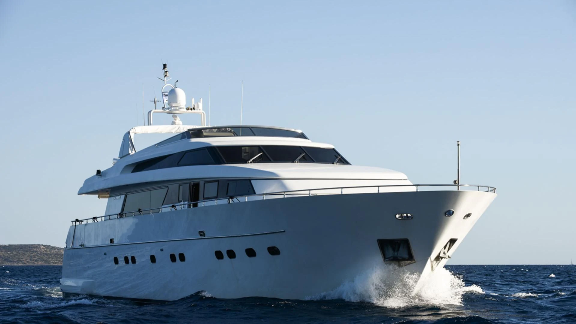 a white yacht in the water aboard ZEN Yacht for Sale