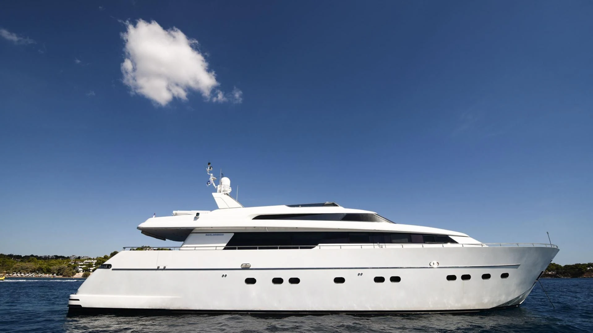 a white yacht on the water aboard ZEN Yacht for Sale