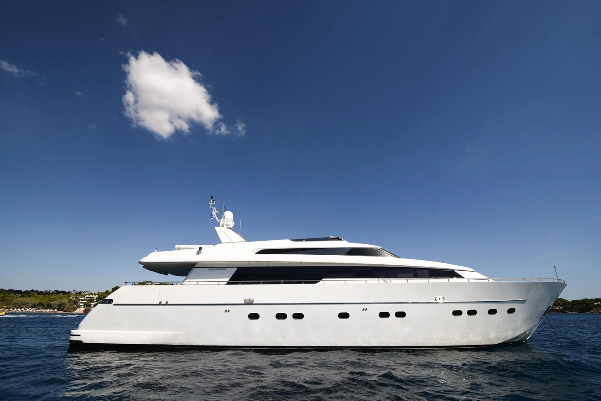 a white yacht on the water aboard ZEN Yacht for Sale