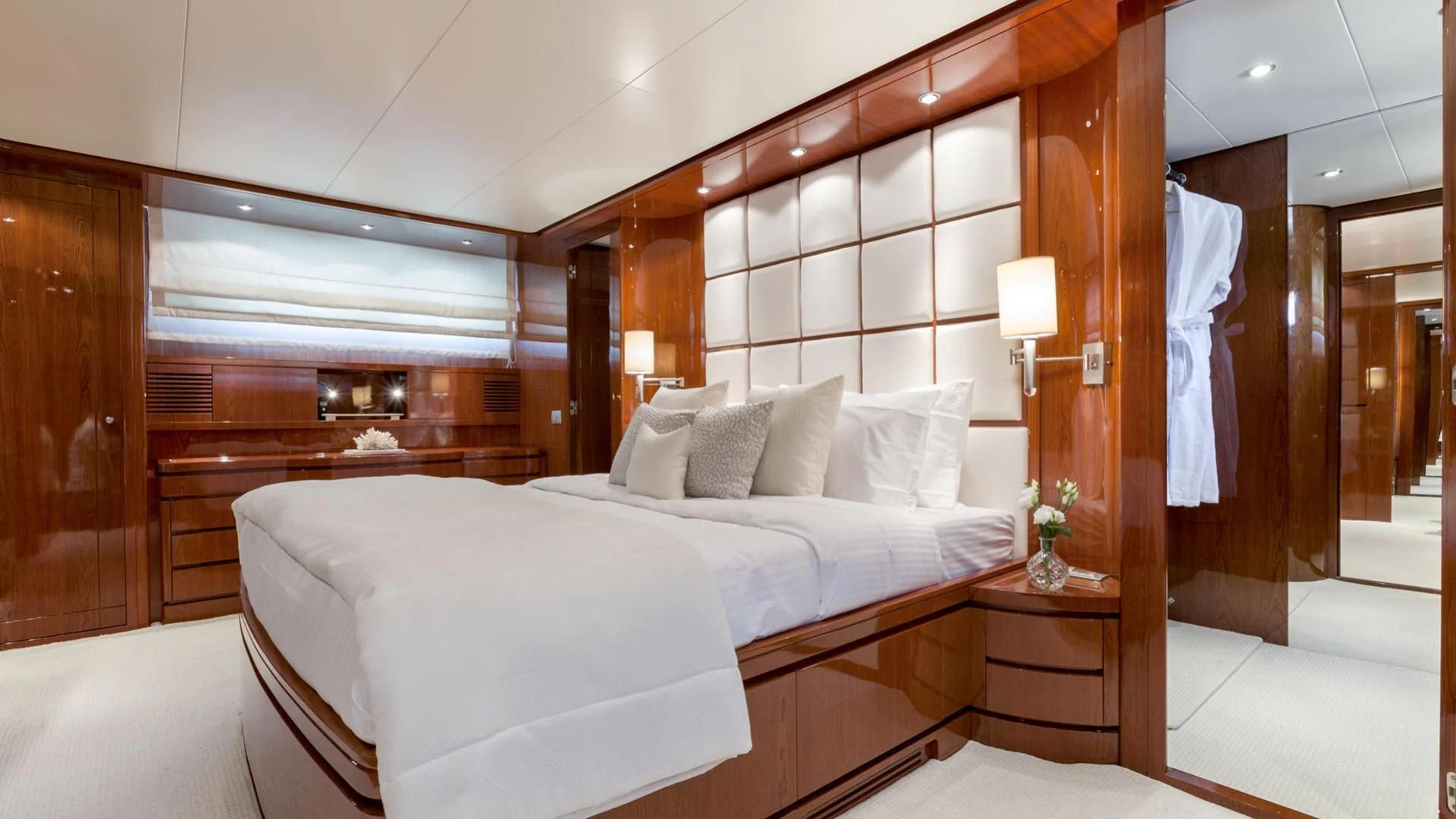 a room with a bed and a desk aboard ZEN Yacht for Sale