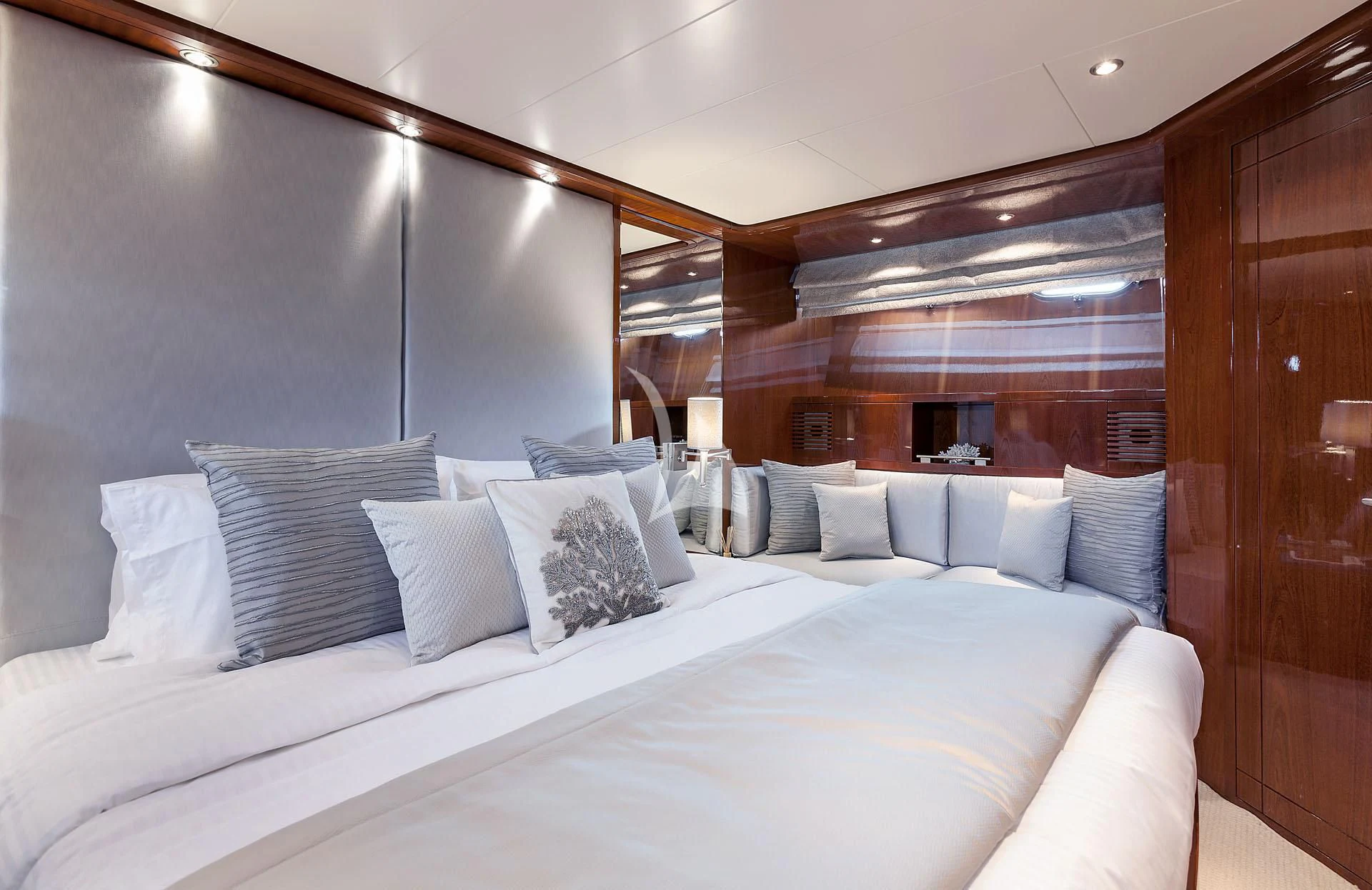 a bed with pillows aboard ZEN Yacht for Sale