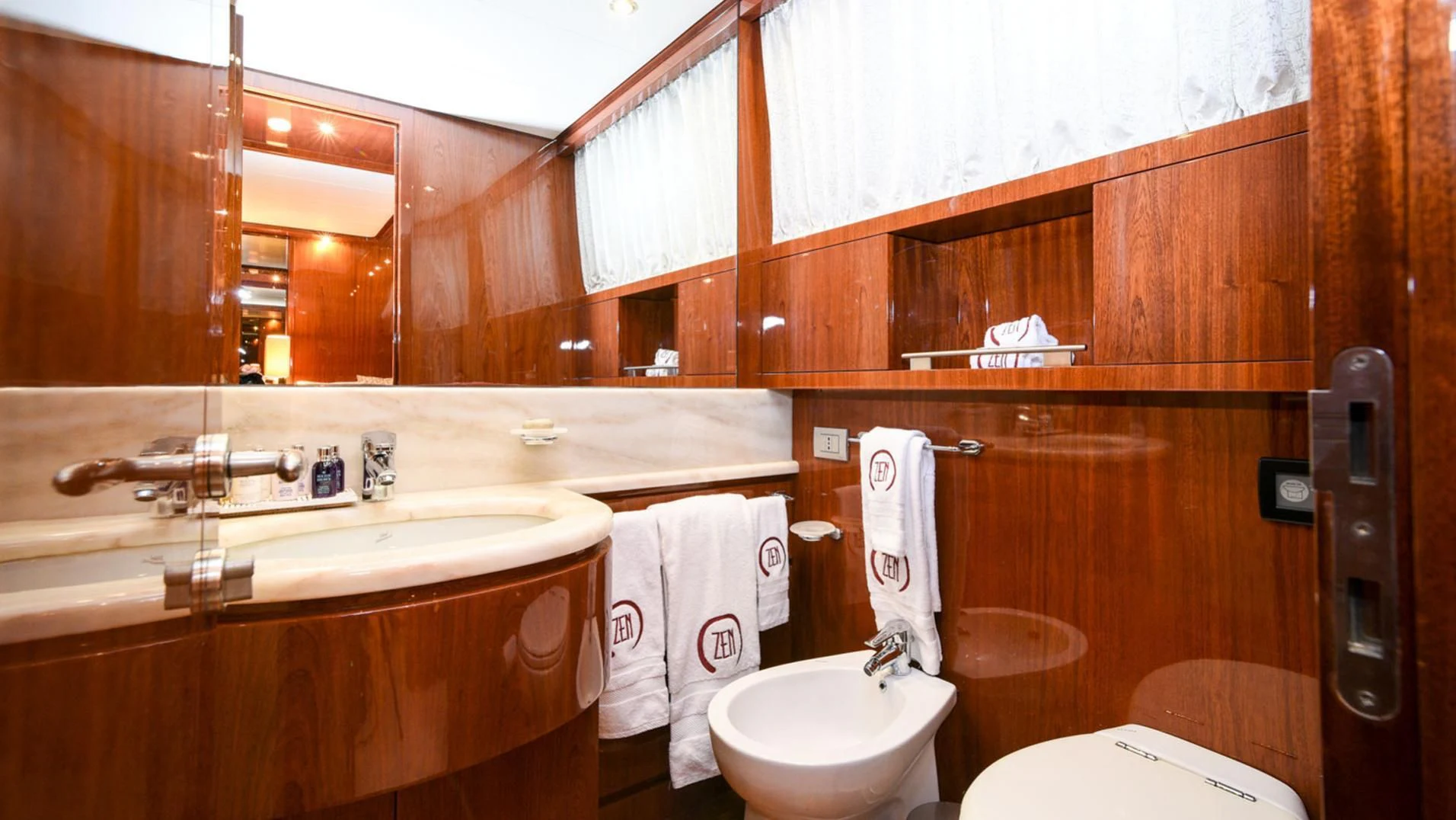 a bathroom with a sink and toilet aboard ZEN Yacht for Sale
