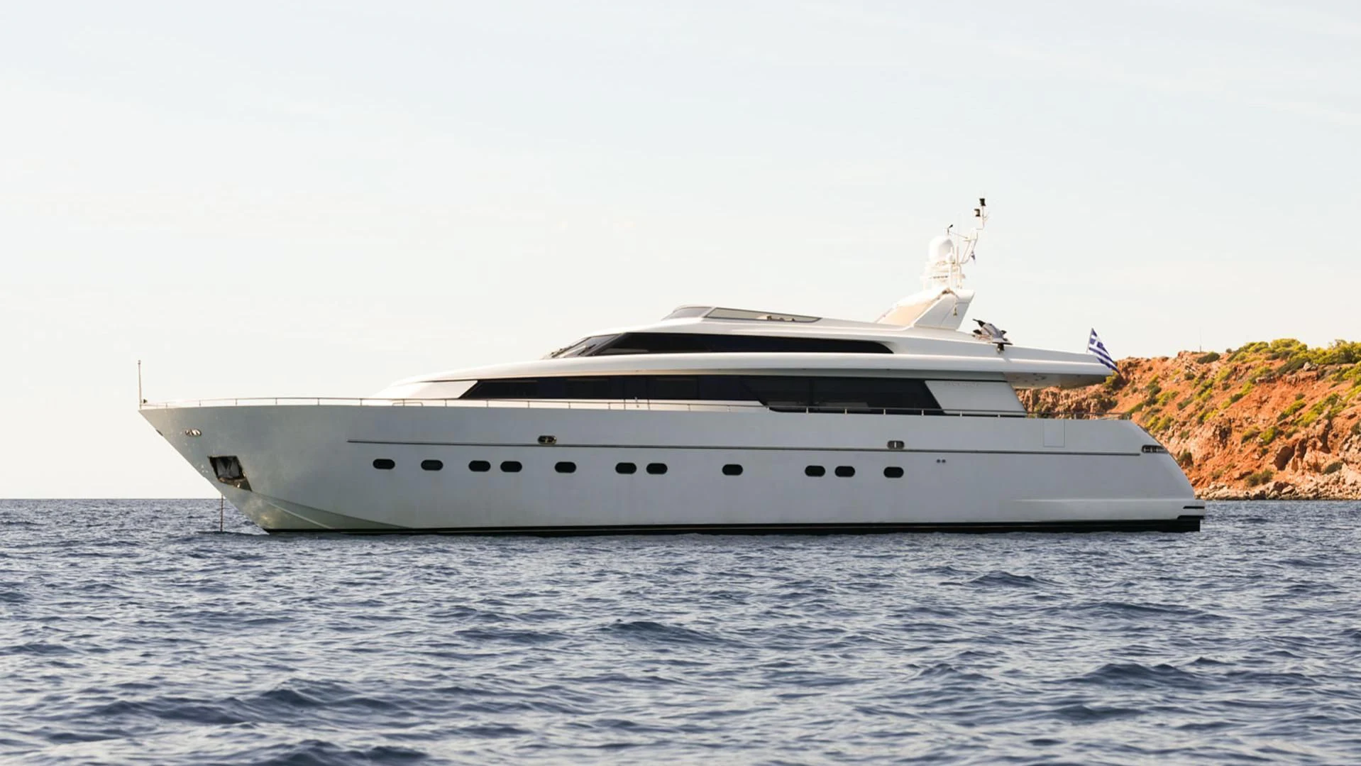a white yacht in the water aboard ZEN Yacht for Sale