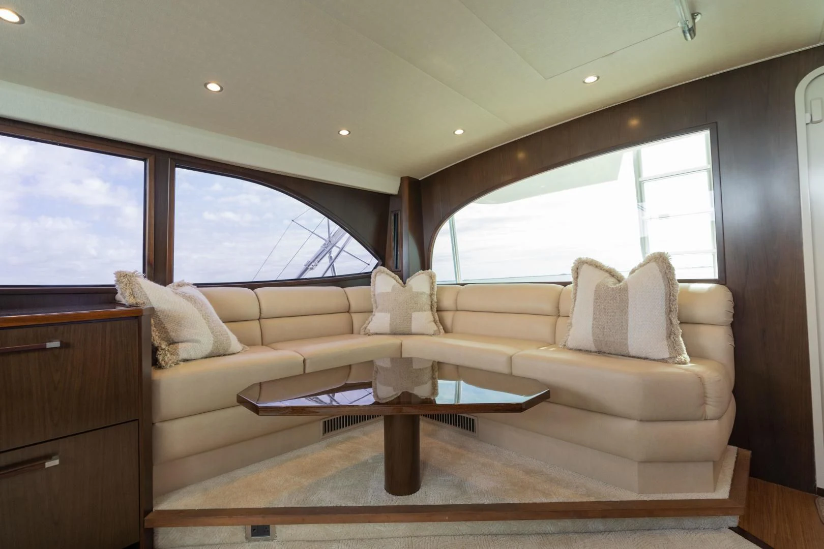 a living room with a couch and a coffee table aboard MER SEA SAKES Yacht for Sale