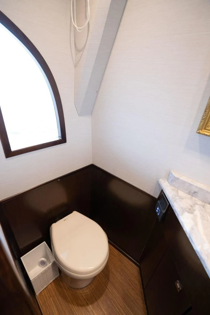 a small bathroom with a toilet aboard MER SEA SAKES Yacht for Sale