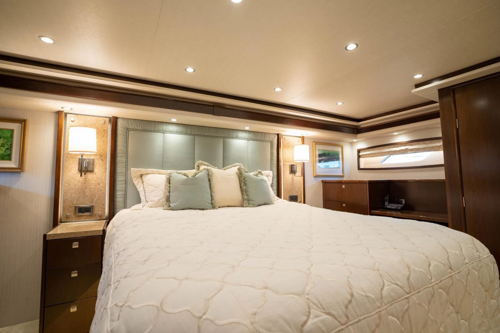a large bed in a hotel room aboard MER SEA SAKES Yacht for Sale