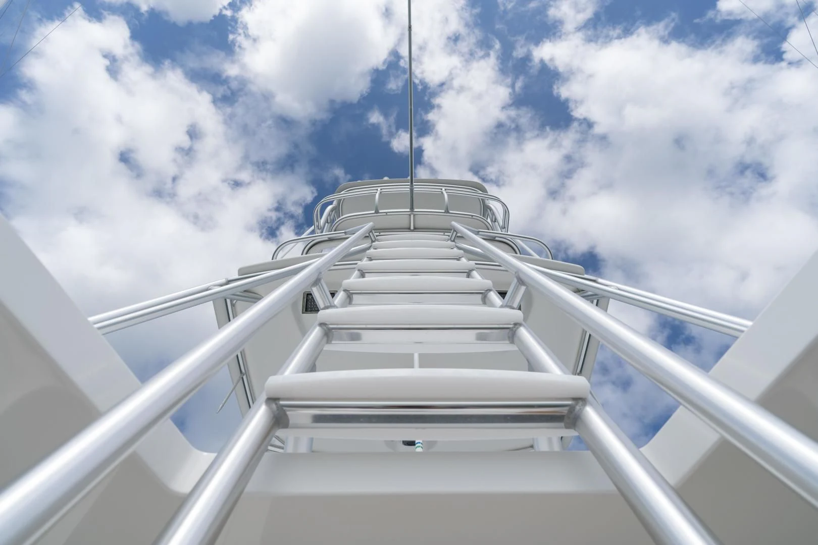 a white staircase with a railing aboard MER SEA SAKES Yacht for Sale
