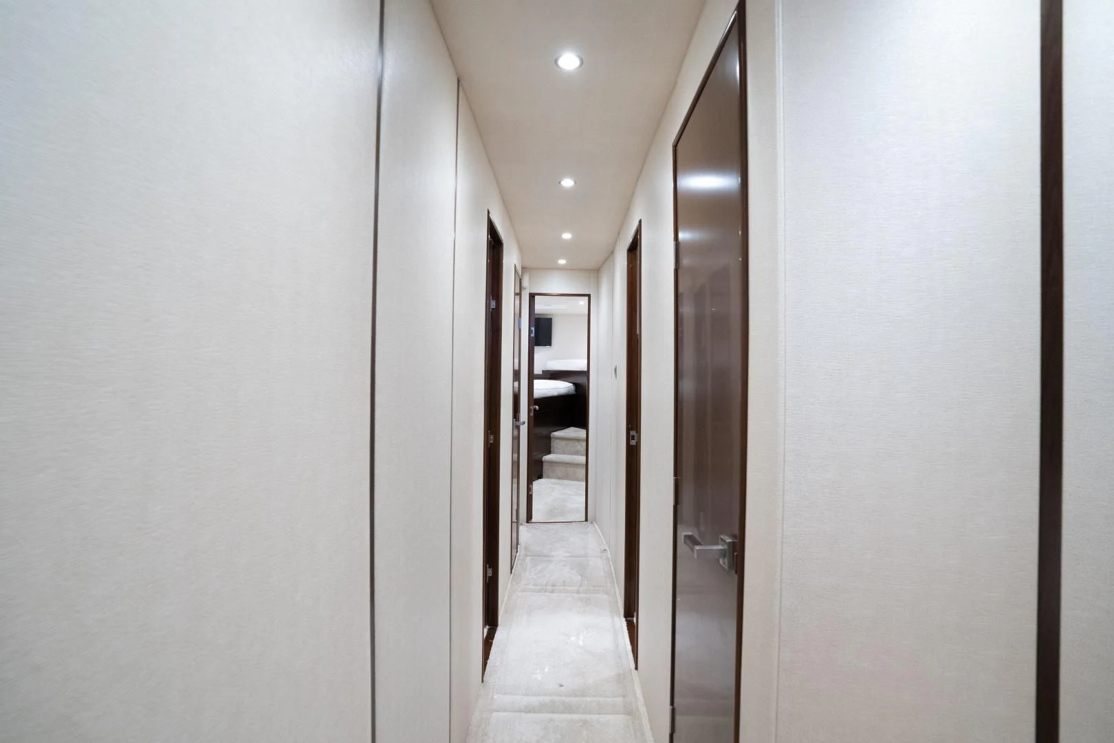 a hallway with doors aboard MER SEA SAKES Yacht for Sale