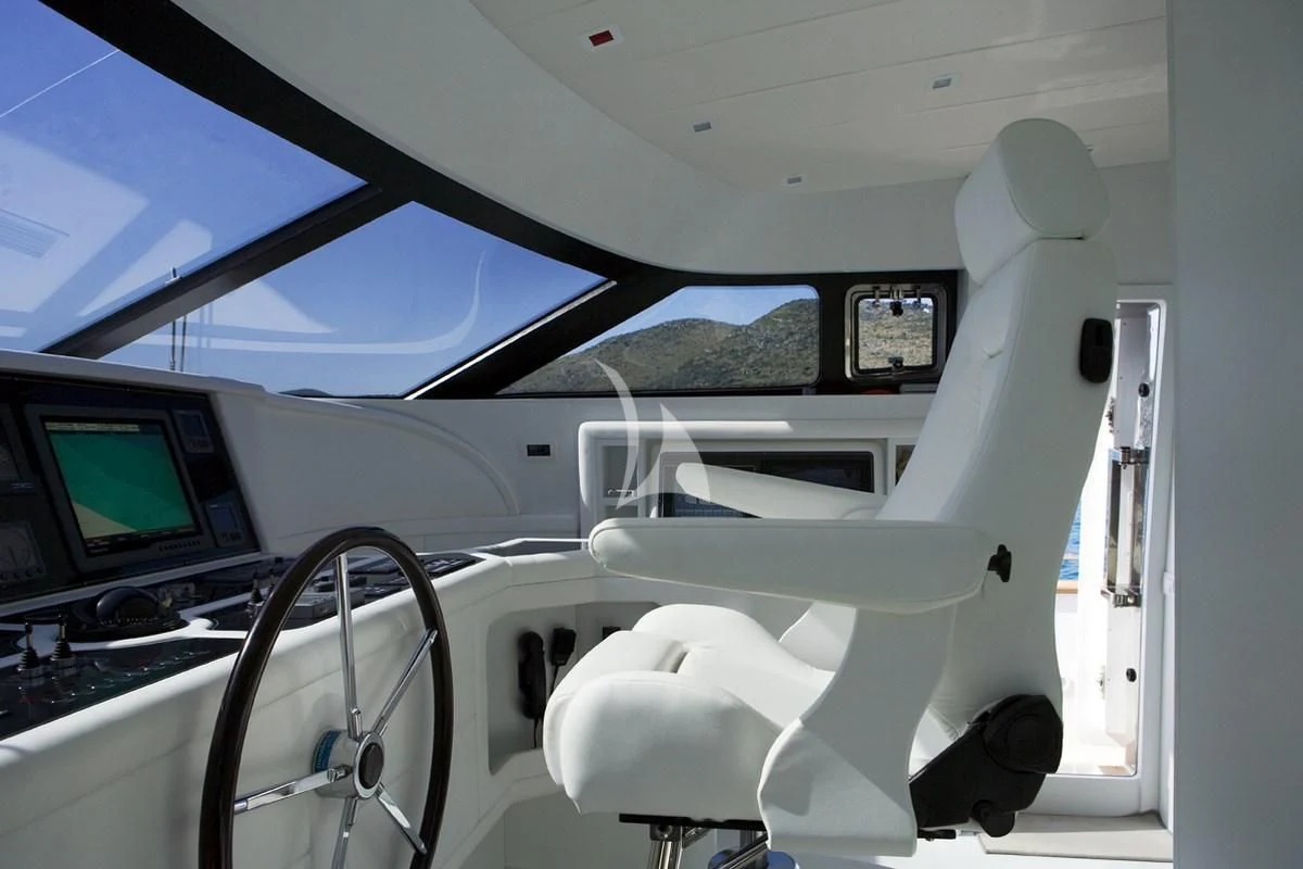 a plane with a screen and a window aboard NIKCA Yacht for Sale