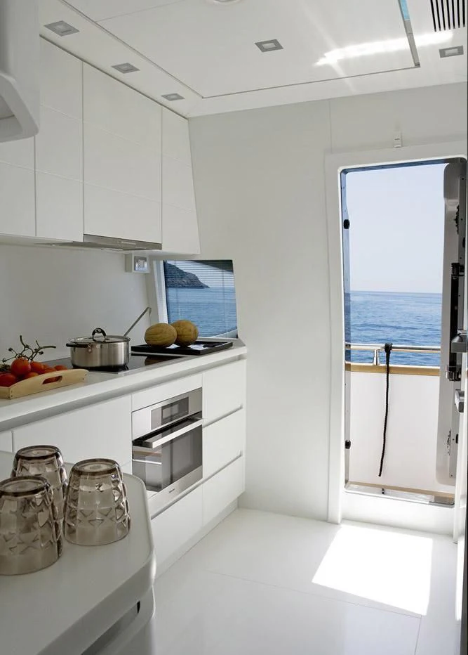 a kitchen with a window aboard NIKCA Yacht for Sale