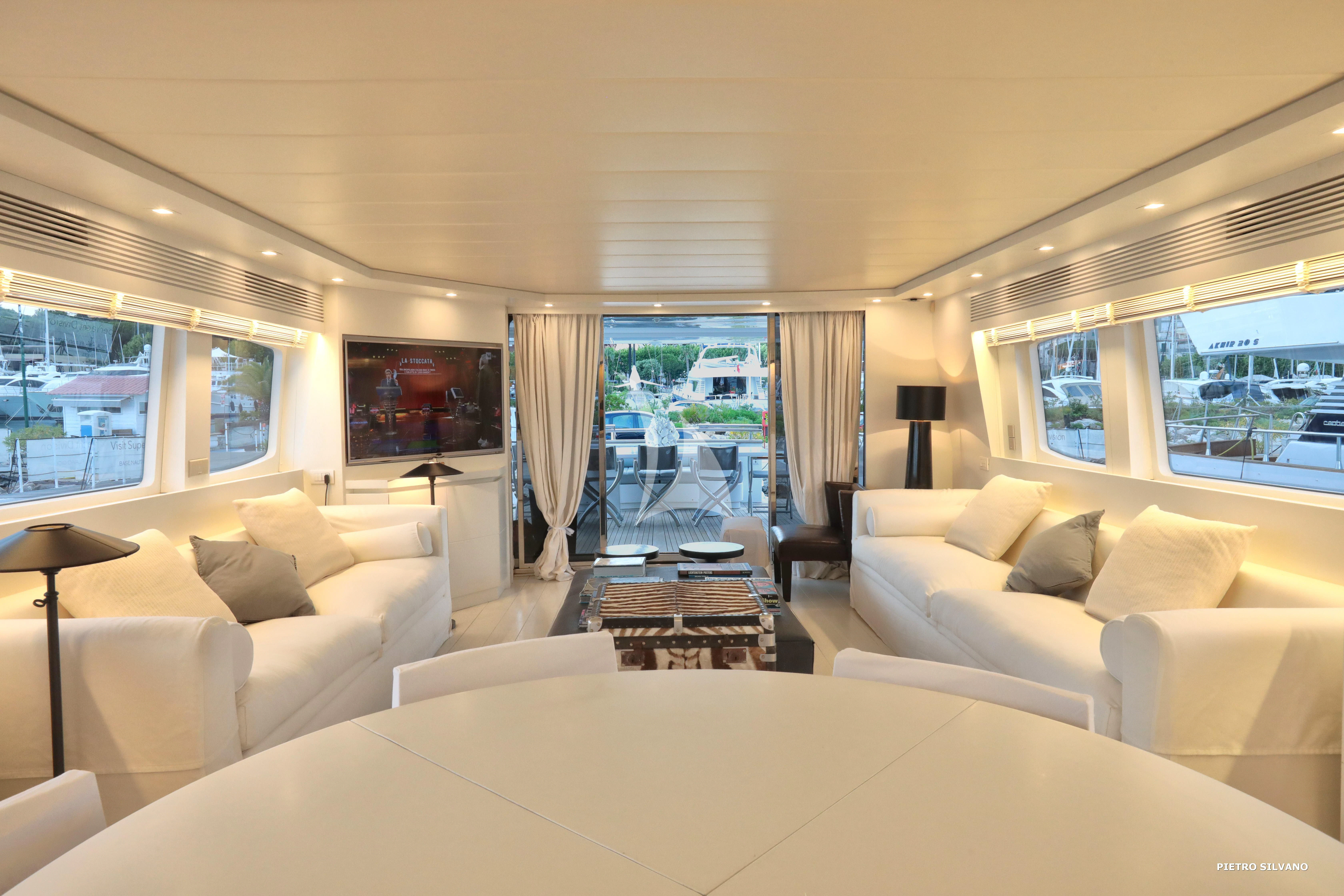 a large white bed in a room aboard NIKCA Yacht for Sale
