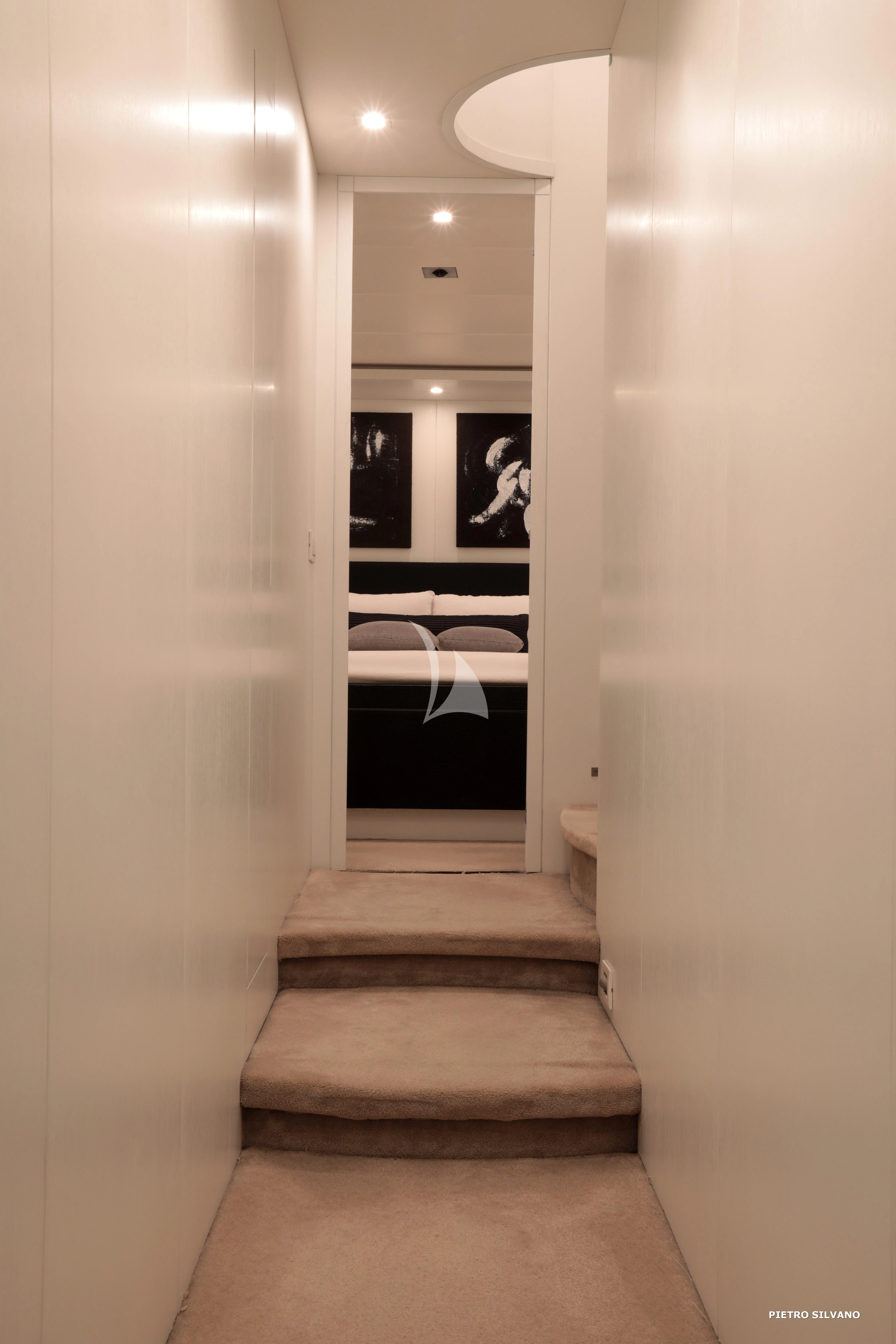 a hallway with a door aboard NIKCA Yacht for Sale
