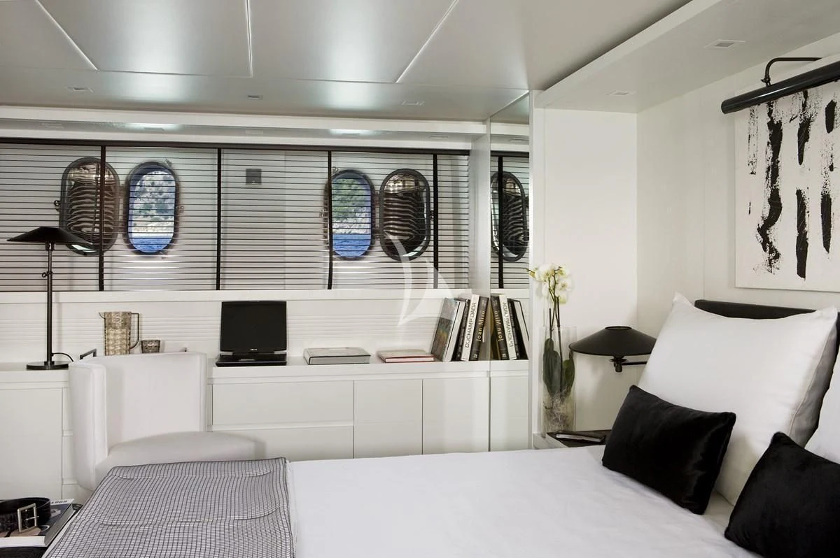 a room with white furniture aboard NIKCA Yacht for Sale