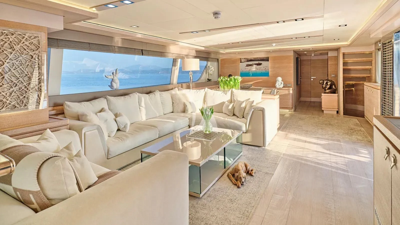 a living room with a large screen aboard DALOLI Yacht for Charter