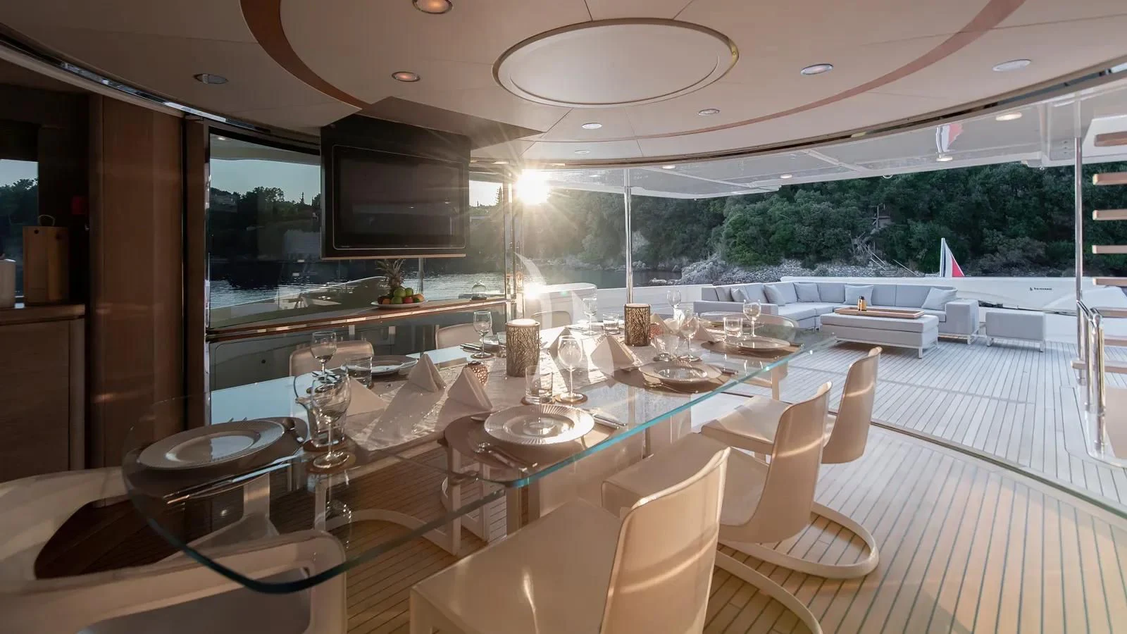 a room with tables and chairs aboard DALOLI Yacht for Charter