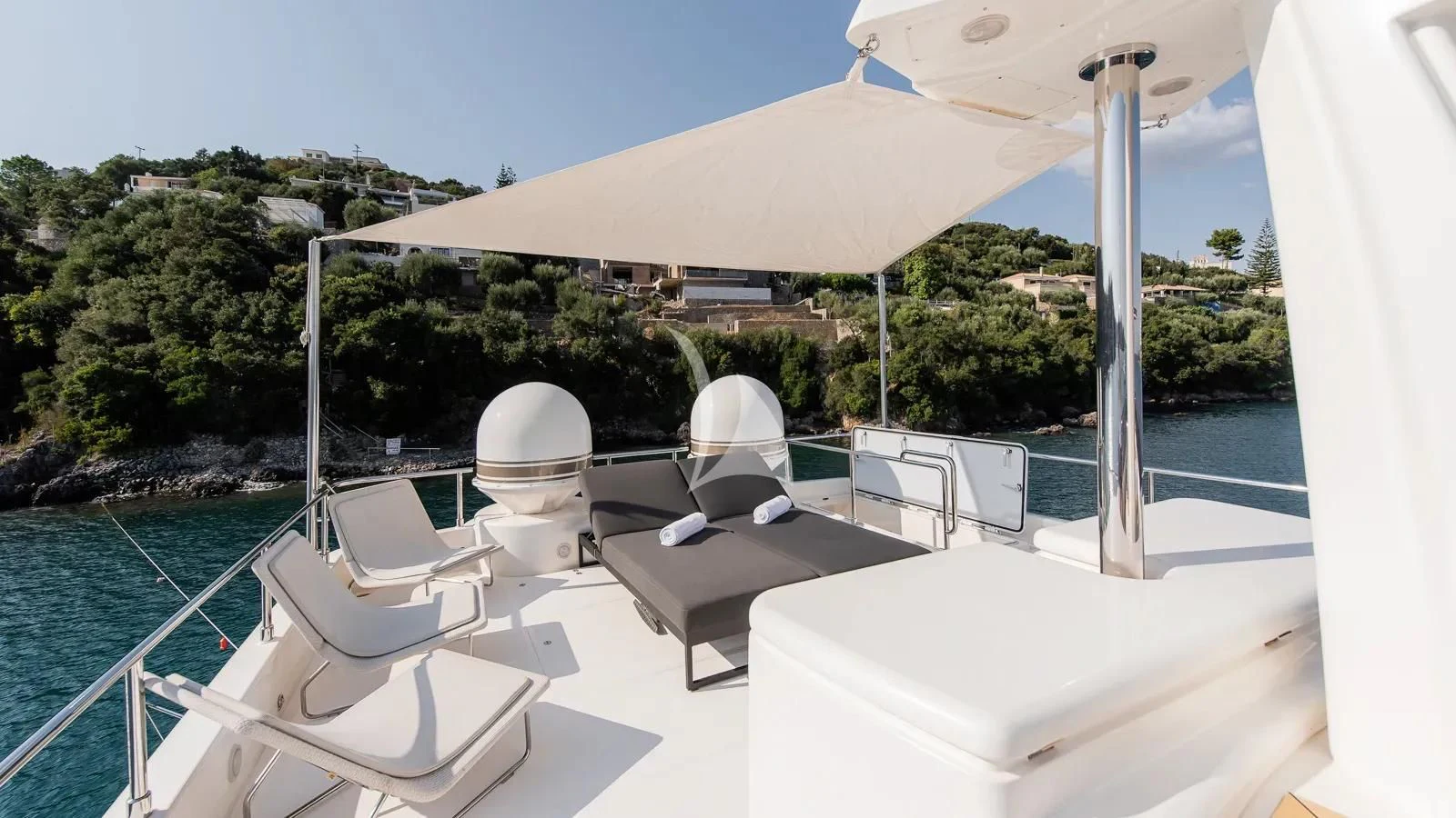 a room with a pool and lounge chairs aboard DALOLI Yacht for Charter