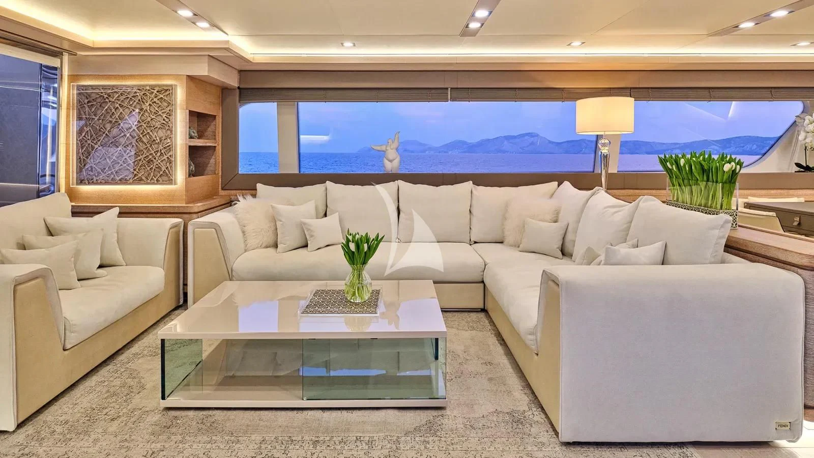 a living room with a large window aboard DALOLI Yacht for Charter