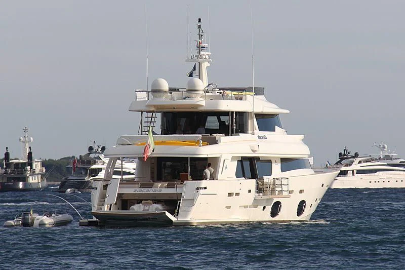 a large white boat in the water aboard DALOLI Yacht for Charter