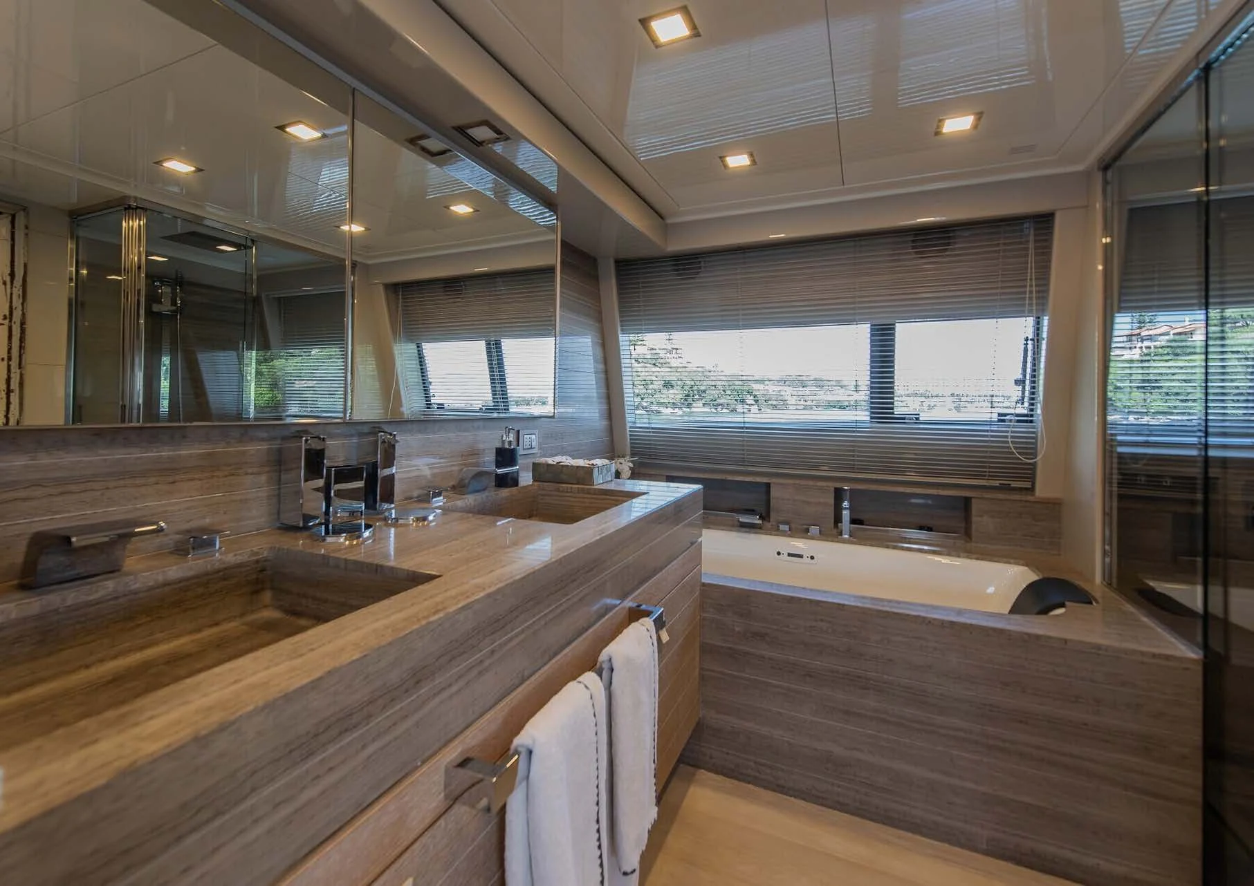a bathroom with a large window aboard DALOLI Yacht for Charter