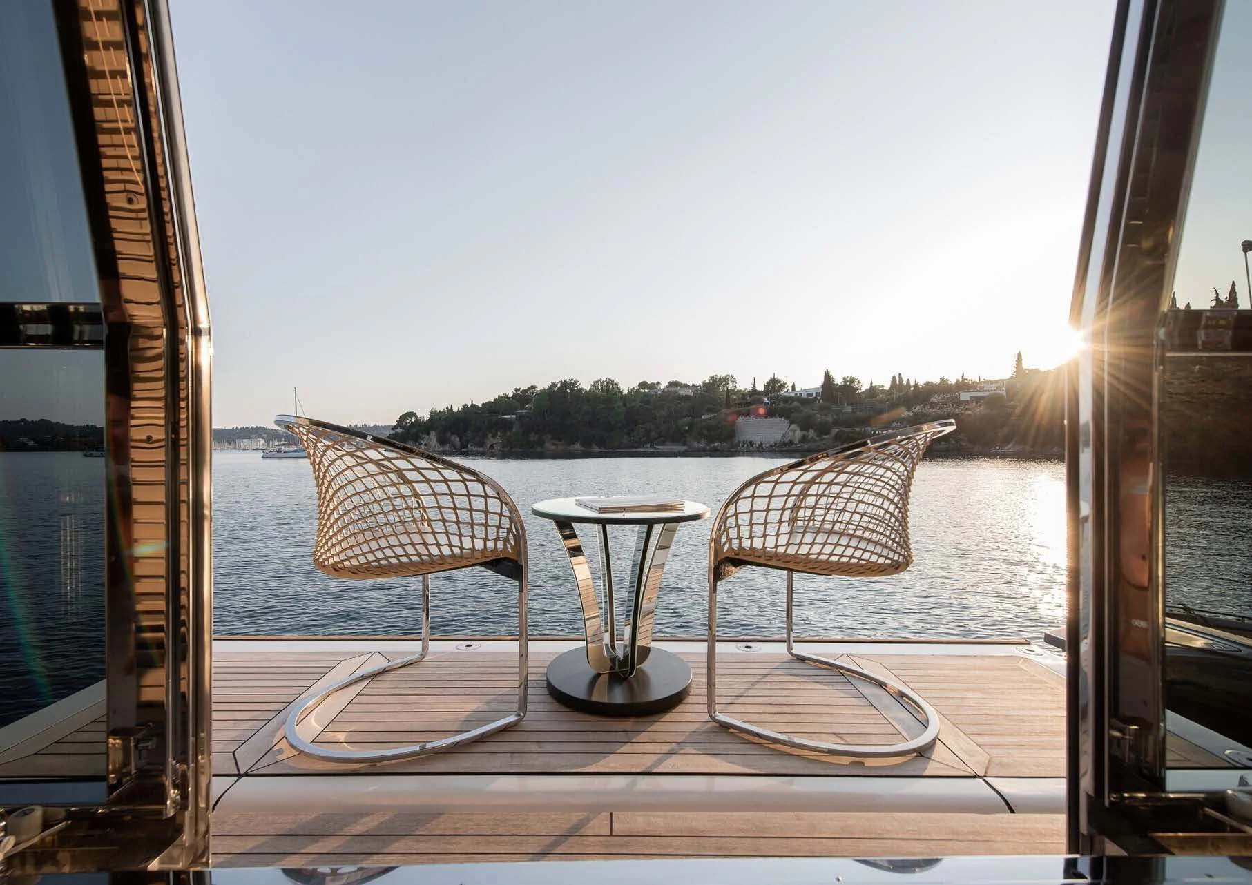 a table with umbrellas on it aboard DALOLI Yacht for Charter