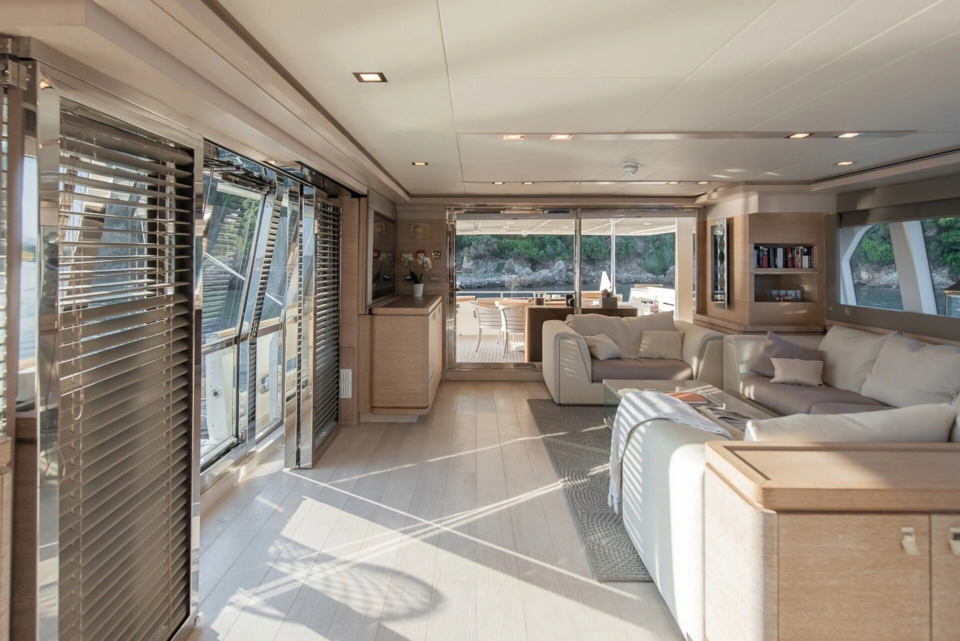 a room with a glass wall aboard DALOLI Yacht for Charter