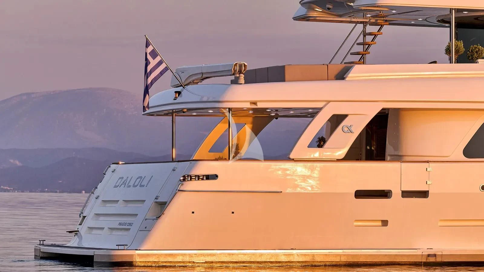 a large white boat aboard DALOLI Yacht for Charter