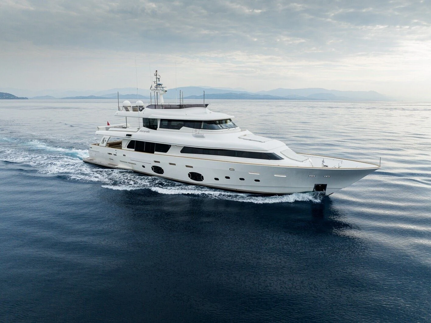 a white yacht in the water aboard DALOLI Yacht for Charter