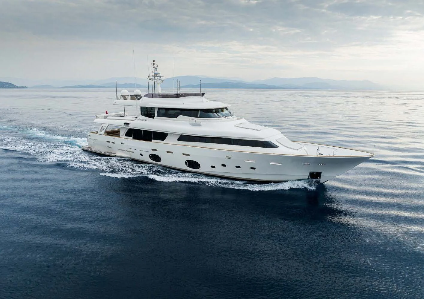 a white yacht in the water aboard DALOLI Yacht for Charter