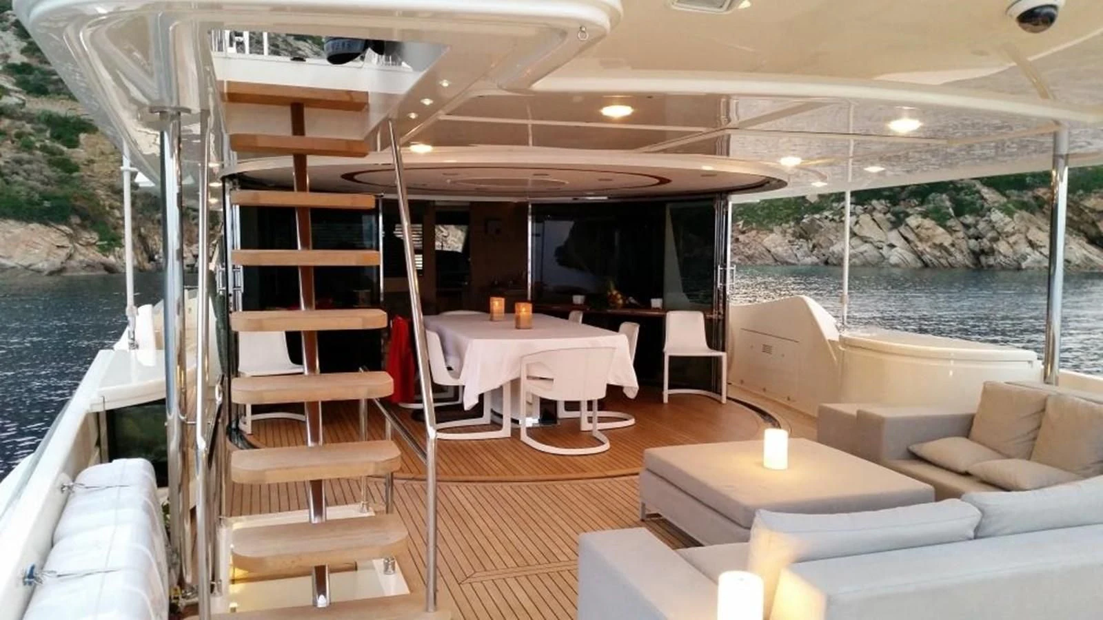 a room with a table and chairs aboard DALOLI Yacht for Charter