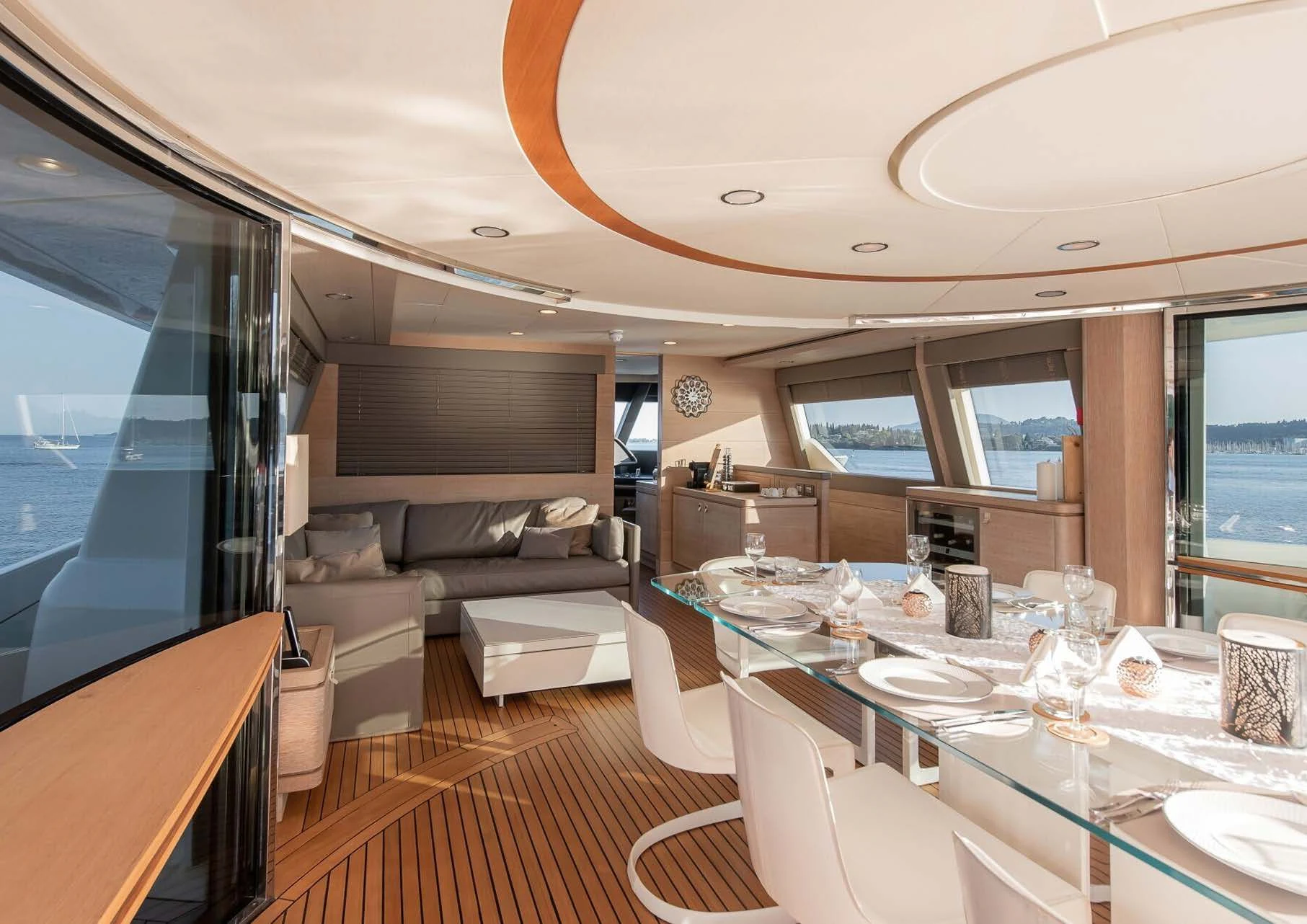 a living room with a table and chairs aboard DALOLI Yacht for Charter
