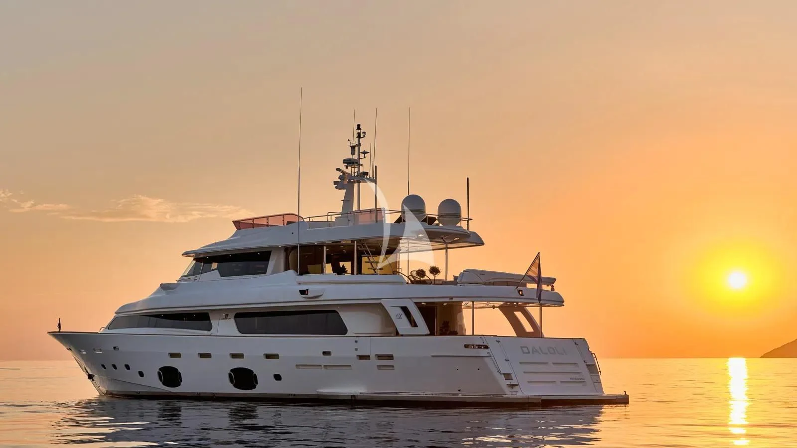 a white boat in the water aboard DALOLI Yacht for Charter