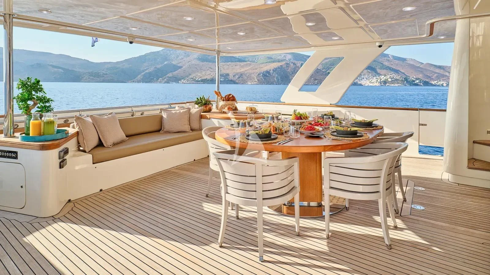 a room with a table and chairs aboard DALOLI Yacht for Charter
