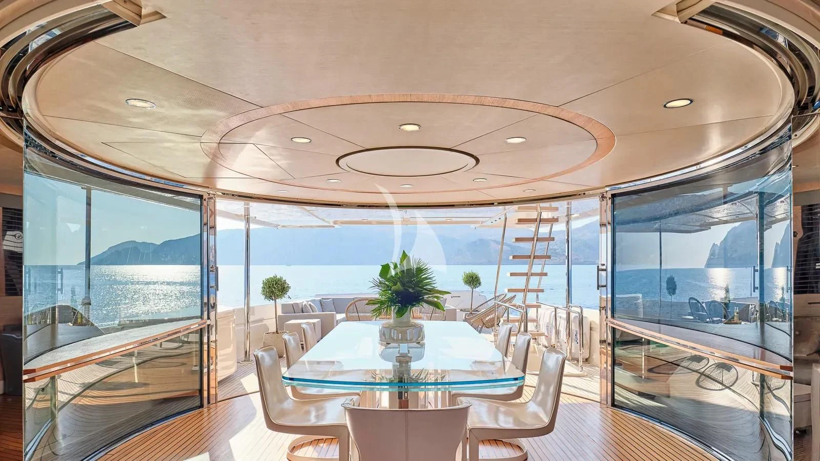 a room with a table and chairs aboard DALOLI Yacht for Charter