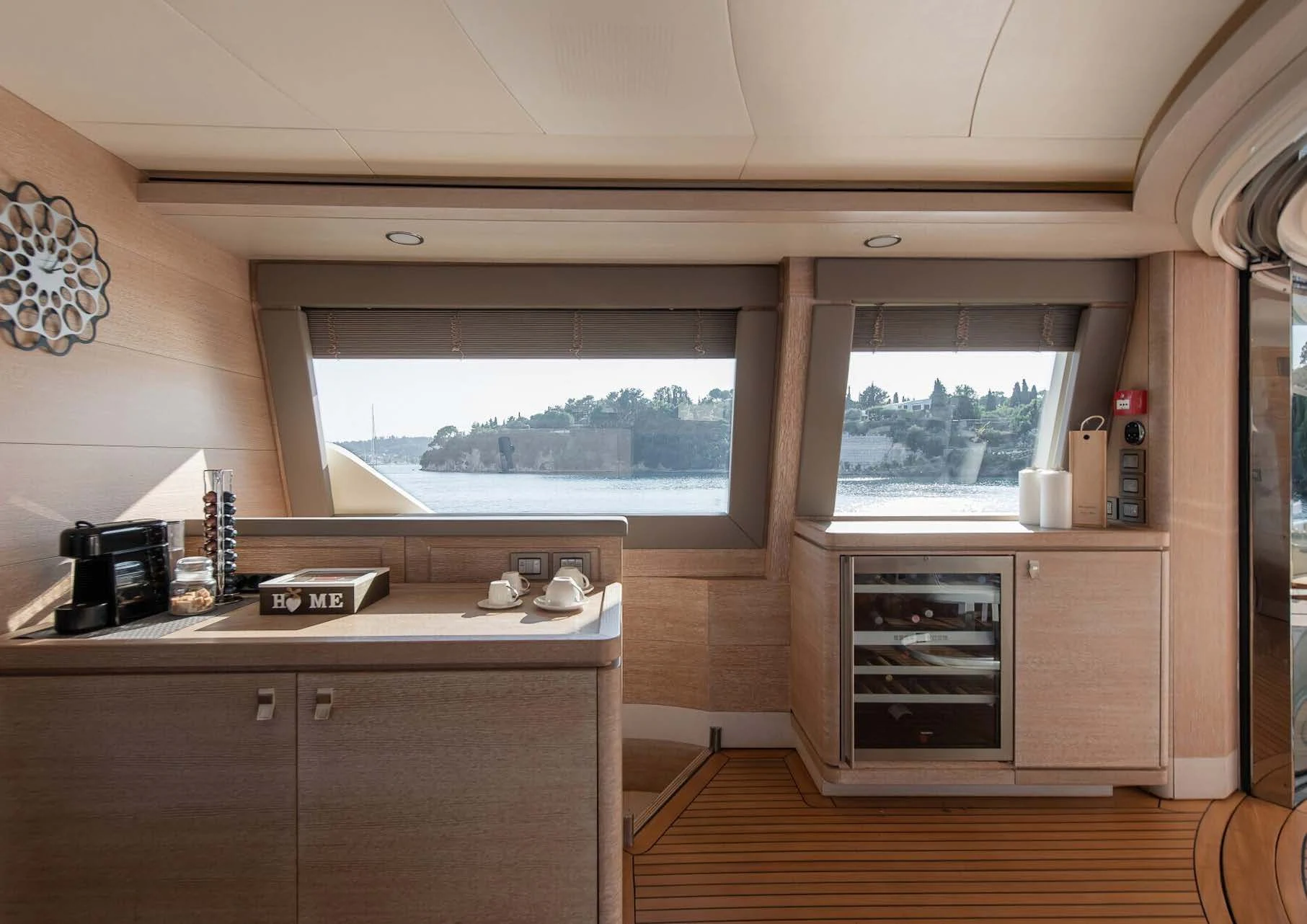 a kitchen with a large window aboard DALOLI Yacht for Charter